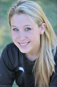 Smiling Blue Eyes Blonde Teen With Freckles